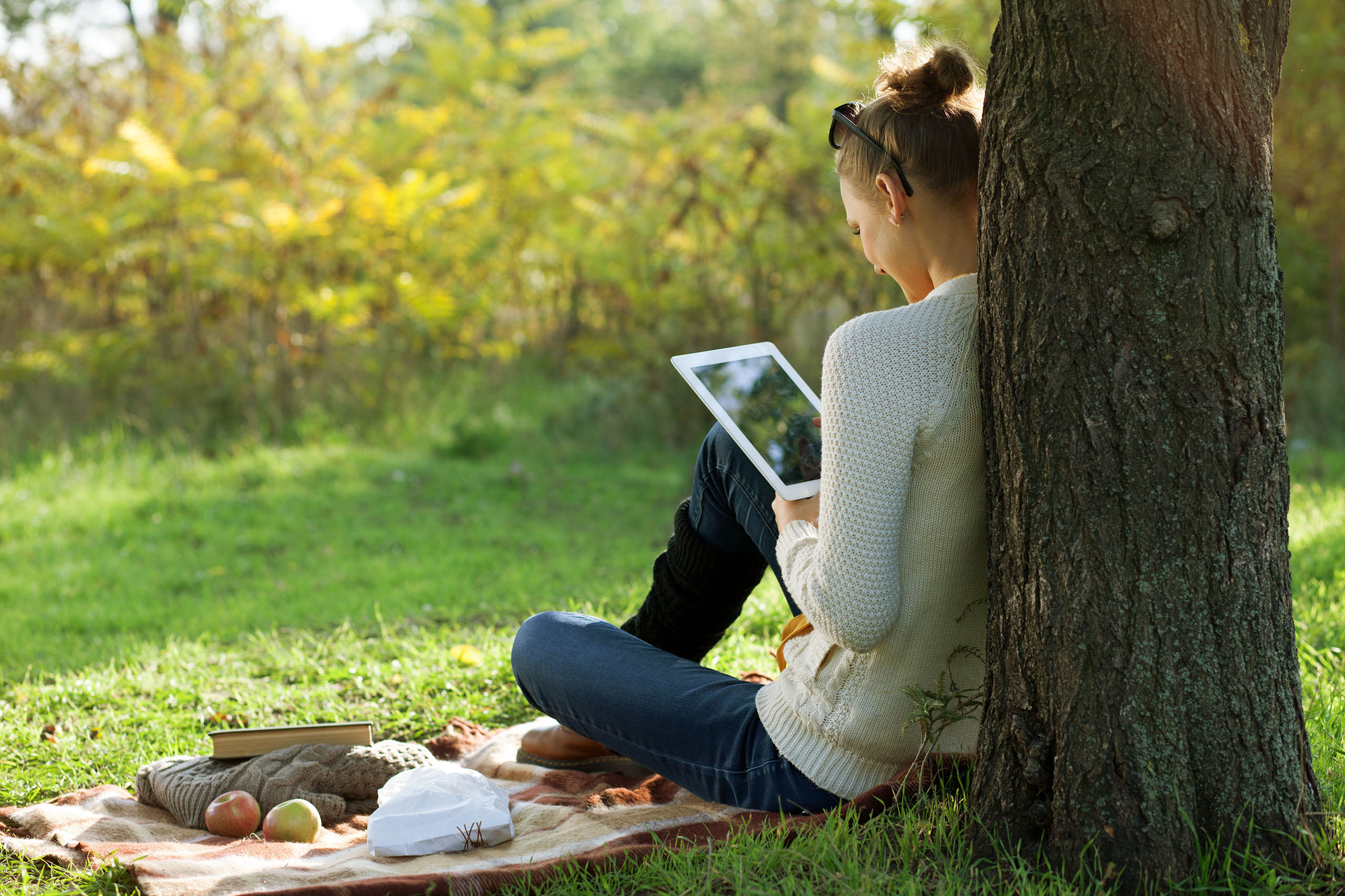 Home Page Slider - Woman With iPad on Grass