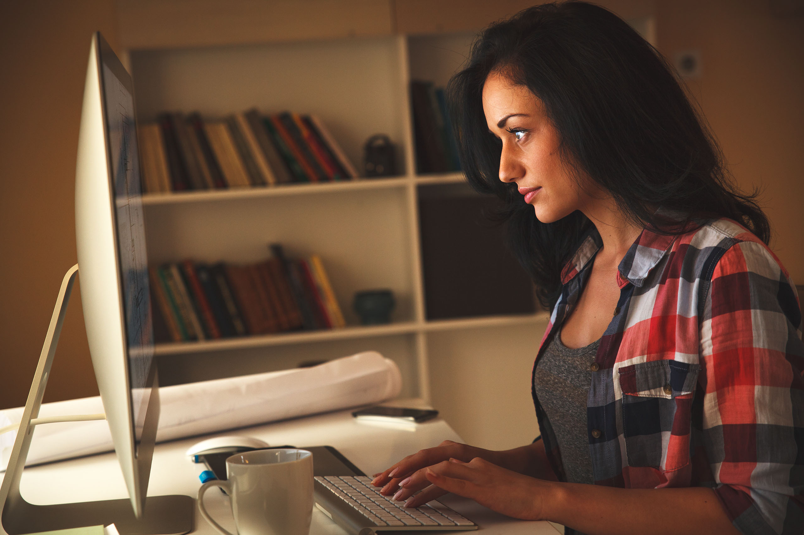Home Page Slider - Woman on iMac in Office
